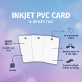 Three blank white key tags on a blue background with labels showing holes, rounded corners, and inkjet printing areas