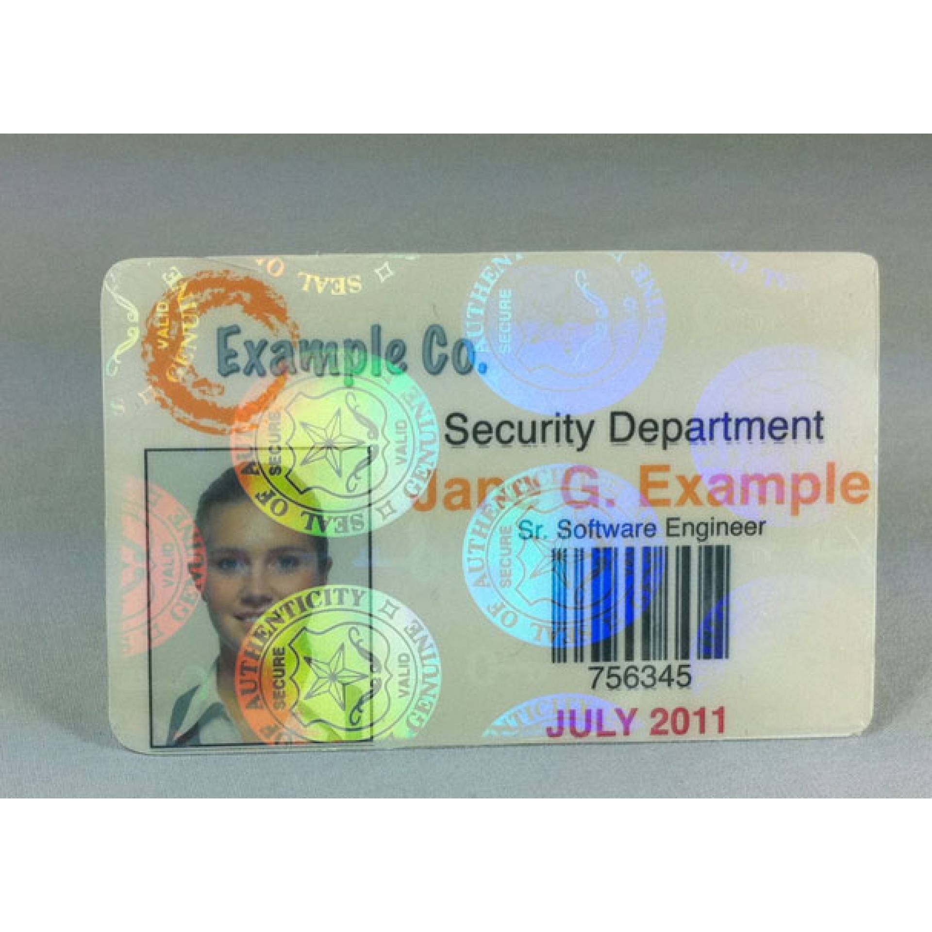 Sample ID card with hologram seals, barcode, photo, and text for Security Department